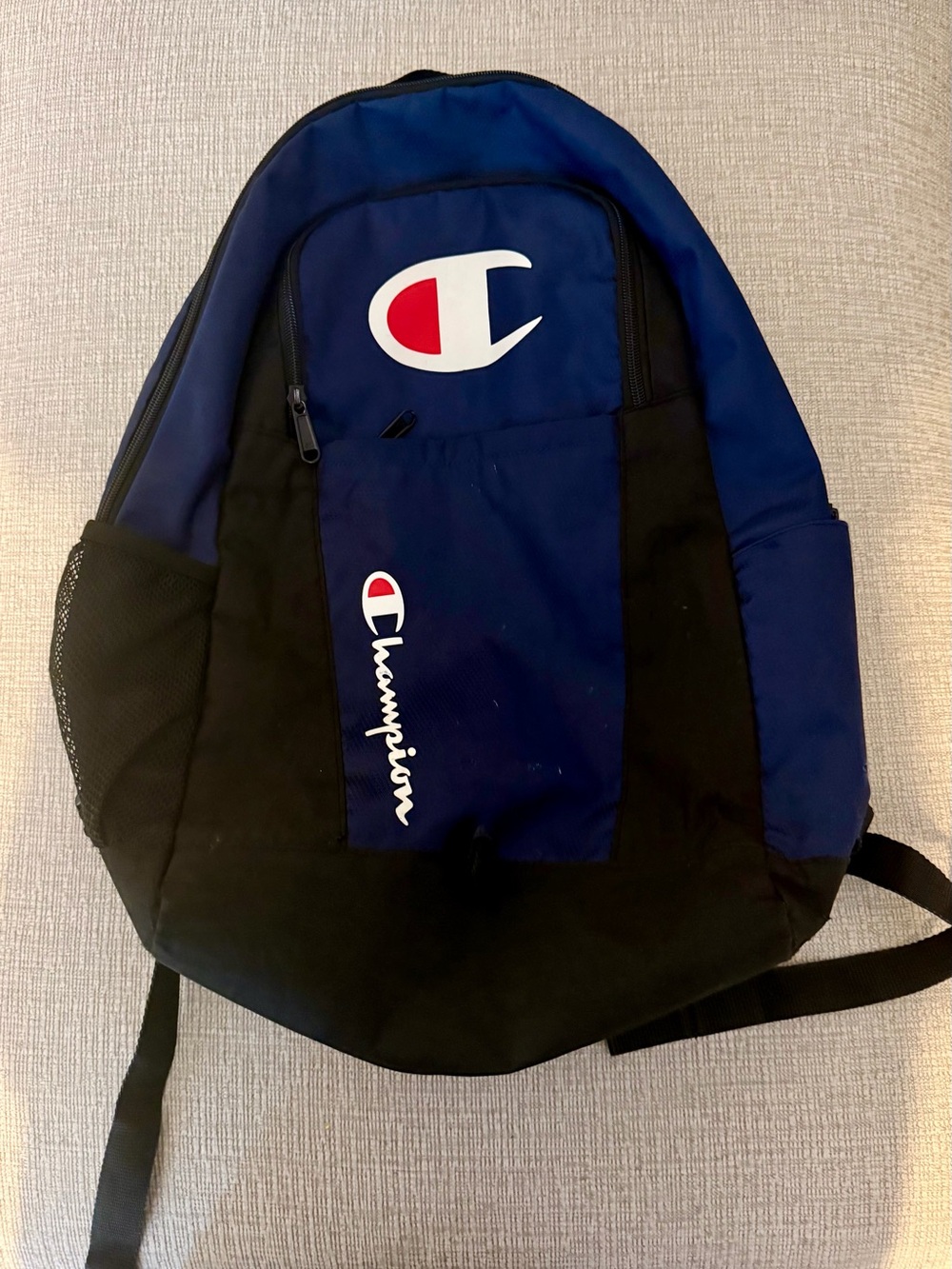 Champion Blue and Black Logo Backpack with Red Accent